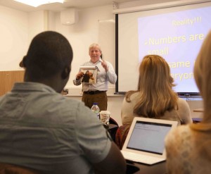 CEO DR Hugh Milroy speaks to MA students at Kings College